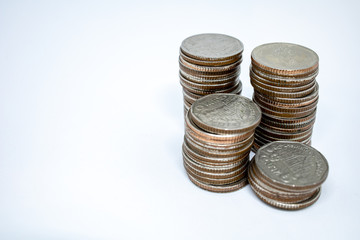 Currency in Thai baht with silver coins on white background. Abstract of saving money