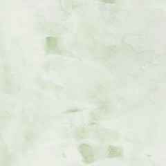 Naklejka premium Green ink and watercolor textures on white paper background. Paint leaks and ombre effects. Hand painted abstract image.