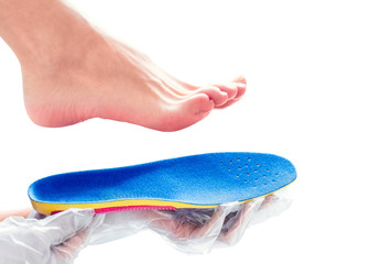 orthopedic insole in the hands