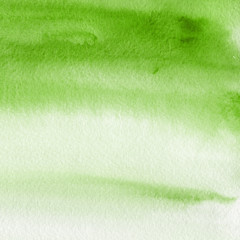 Green ink and watercolor textures on white paper background. Paint leaks and ombre effects. Hand painted abstract image.