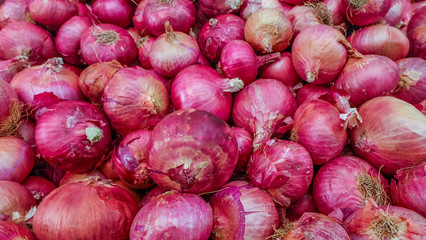 Fresh onions bombay (Loose) Onions bombay background. Ripe onions bombay . Onions bombay in market.