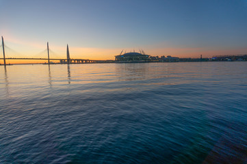 Views to Lakhta. The Gulf of Finland illuminated by multi-colored lights at night.