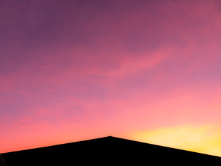 Silhoutte Roof in The Bottom behind The Twilight Sky