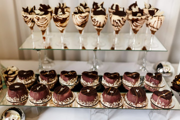 Traditional Italian dessert tiramisu in a glass. wedding dessert for the holidays.