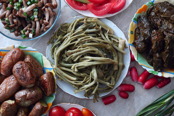 Pickled prickly russian thistle, mushrooms, baked potato, tolma. Pickled tumbleweed, tolma, dolma, baked potato, marinated mushrooms, vegetables