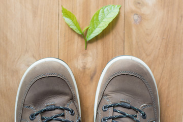 Close up vintage leather shoes man accessory. Men's casual outfits with accessories on rustic wood background.