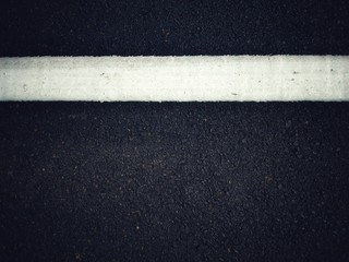 Fototapeta premium Road traffic paint White on the asphalt surface