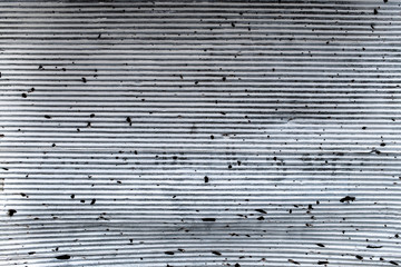 iron curtain with bullet holes, Syria 2019