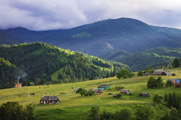 Scenic summer or spring mountain view with cloudy sky. Ukraine, Carpathians, Dzembronia High mountains in vivid color. Nobody. Beautiful mountain lanscape or valley. - 265471877