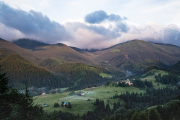 Scenic summer or spring mountain view with cloudy sky. Ukraine, Carpathians, Dzembronia High mountains in vivid color. Nobody. Beautiful mountain lanscape or valley. - 265472028