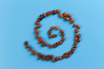 Coffee grains in the shape of a swirl