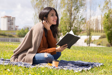 Fototapeta premium Cheerful student girl studying her notes