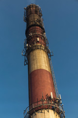 industrial white, red, high concrete chimney