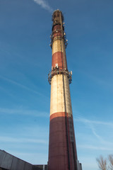 industrial white, red, high concrete chimney