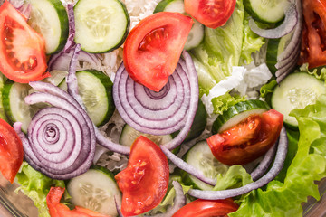 Fresh sliced salad of different vegetables close - up