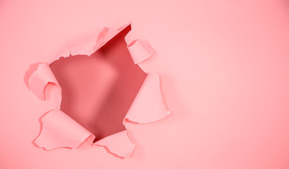 The background is pink with a hole for advertisement