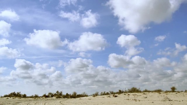 Sky timelapse on the wild beach