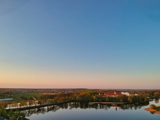 Fototapeta na wymiar Sunset over the lake in Nesvizh in Minsk Region of Belarus
