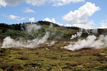 Orakei Korako hidden geothermal valley: View on steaming hills (Fumaroles)