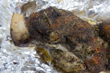 baked bacon with spices in foil