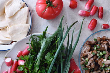 Sulguni cheese, fresh greens and marinated mushrooms. Appetizers top view