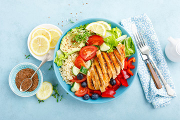 Lunch bowl with grillet chicken breast, fillet, bulgur and fresh vegetable salad