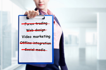 Business, technology, internet and networking concept. Young entrepreneur showing keyword: Video...