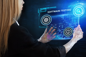 The concept of business, technology, the Internet and the network. A young entrepreneur working on a virtual screen of the future and sees the inscription: Software testing