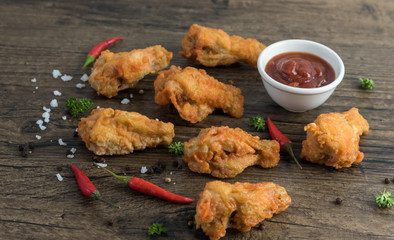 crispy kentucky fried chicken in a wooden table - junk food and unhealthy food.  Breaded Crispy Spicy Fried Chicken tasty dinner