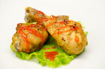 roasted chicken legs studio shot