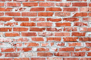 wall of bright old red brick as beautiful loft-style background for modern interior design and exterior of industrial premises, apartments and houses