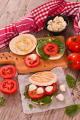 Tigella bread with spinach and tomatoes. 