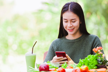 Asian beautiful young girl eating salad vegetable