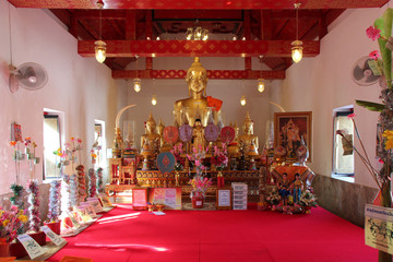 Fototapeta na wymiar altar and statue of buddha in a buddhist temple (wat pa mok) in ang thong (thailand)