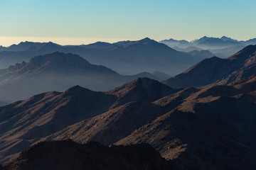 Naklejka na ściany i meble Egypt. Mount Sinai in the morning at sunrise. (Mount Horeb, Gabal Musa, Moses Mount). Pilgrimage place and famous touristic destination.