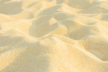Fine beach sand in the summer sun