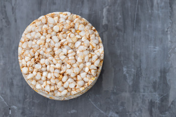 crispy rice diet toasts on ceramic background