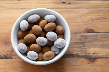 close up of chocolate egg on white dish