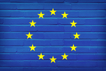 European Union Flag Painted On Brick Wall. Texture Background.