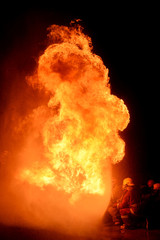 Fototapeta na wymiar fire burning isolated with black background