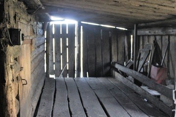 A very ancient building for animals of the times of the USSR was preserved in a dilapidated form in...