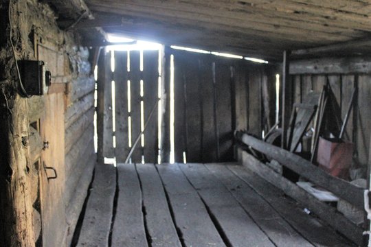 A very ancient building for animals of the times of the USSR was preserved in a dilapidated form in the old village.