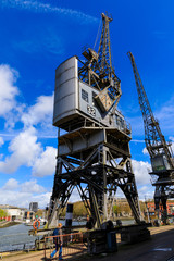 Fototapeta na wymiar Historic cranes in Bristols Floating Harbour