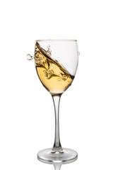 White wine in a wine glass with splashes isolated on white background.
