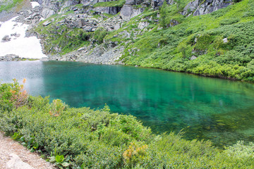 Plakat lake in the mountains, Altai Krai, Russia