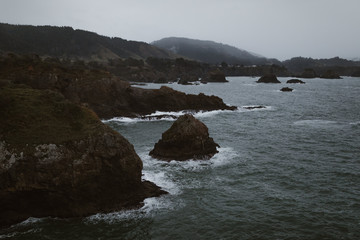 rocky coastal landscape on dark day