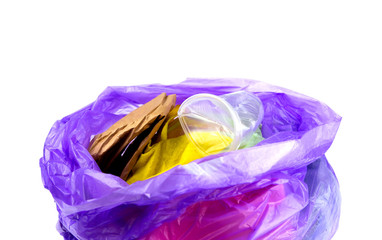 Fototapeta premium Concept of garbage and pollution. A pile of trash, crumpled plastic cup, packages, paper isolate on a white background