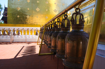 Bells in a row at Wat Phra Singh temple Chiang Mai