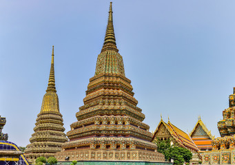 Fototapeta na wymiar Colorful stupas in Wat Pho in Bangkok, Thailand