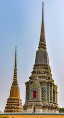 Fototapeta premium Colorful stupas in Wat Pho in Bangkok, Thailand